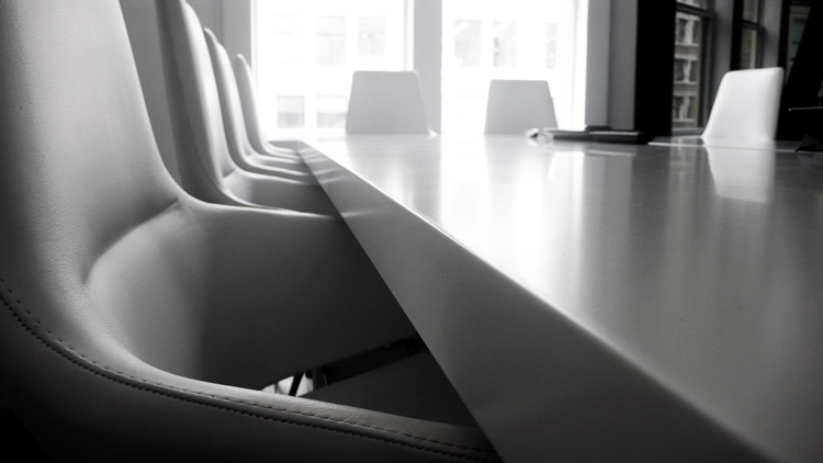 patial Environments - Image showing a boardroom scene with white leather executive chairs and table