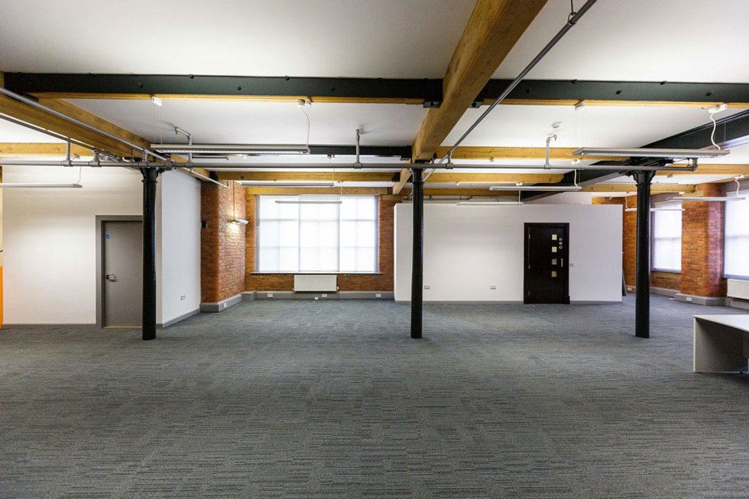 Buffalo 7 - Office space before fit out and furniture installation. Showing north facing view of empty space