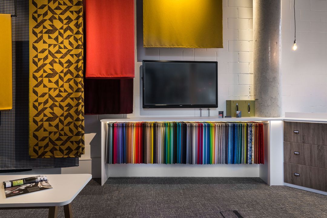 Sharp Big Pad interactive display surrounded by swathes of colourful fabric
