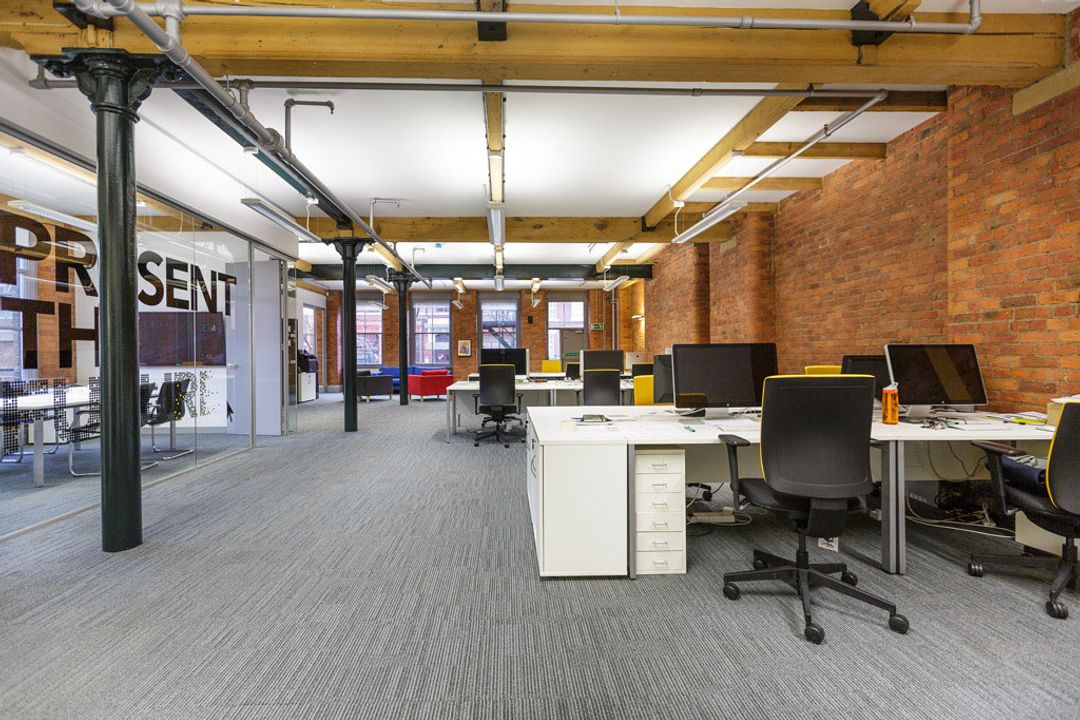 Buffalo 7 - Office space After fit out and furniture installation. Showing alternate length view of main office area
