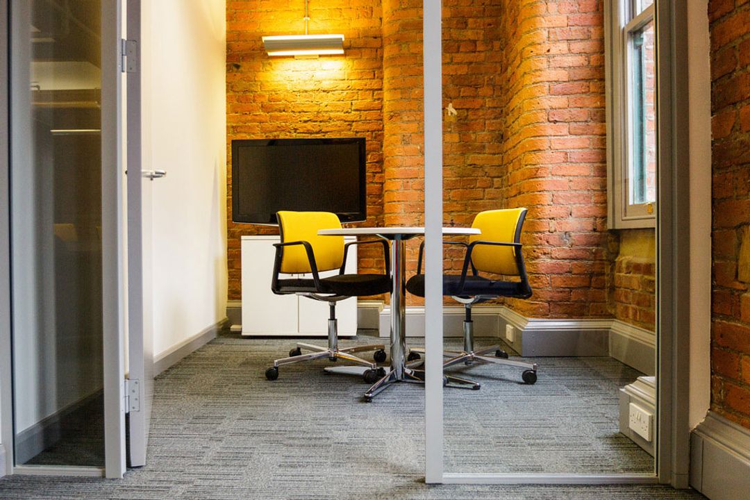 Buffalo 7 - Office space After fit out and furniture installation. Showing small meeting room with Pledge Kind chairs and table