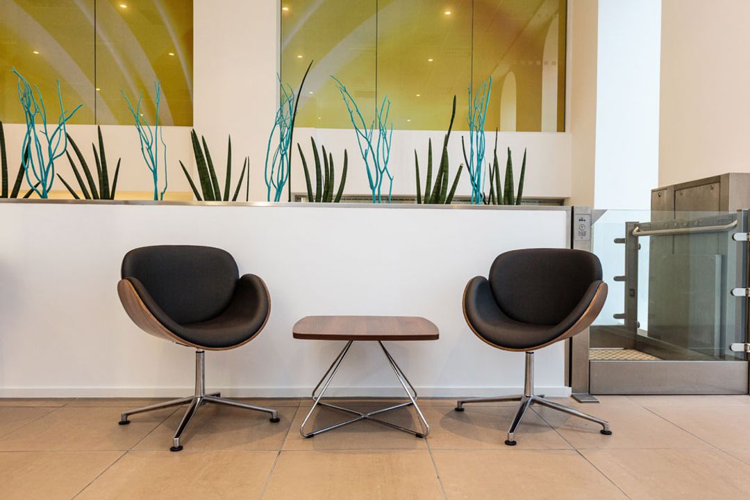 Office Furniture - Set of Spirit shell tub chairs finished in black faux leather and walnut veneer with polished aluminium star bases