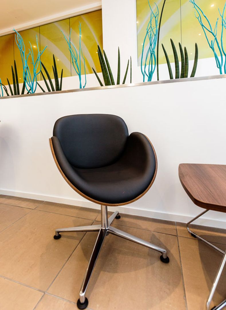 Office Furniture - Spirit shell tub chair finished in black faux leather and walnut veneer with polished aluminium star base