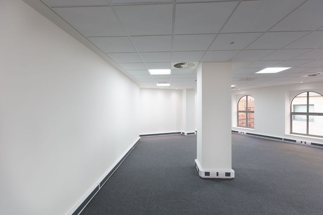 A blank canvas wall before the Spatial Office fit out of Premier Group, Manchester